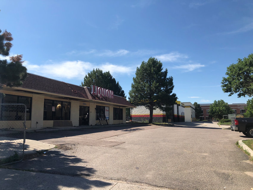 A liquor store and two auto shops would be demolished to make way for the mixed-use Encore project if it is approved by Castle Rock.